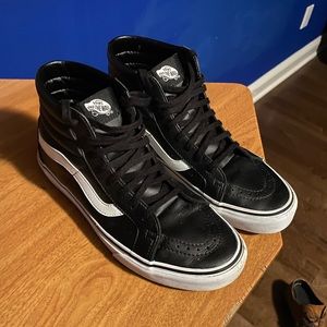 Vans Black leather high tops (men’s 9 women’s 10.5)